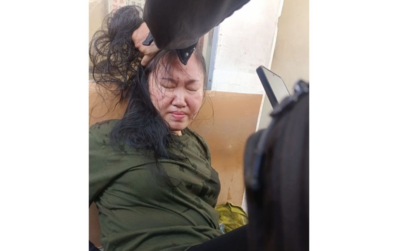 Perempuan yang diduga menjadi pelaku begal sopir taksi online. Foto/PDOI Jatim