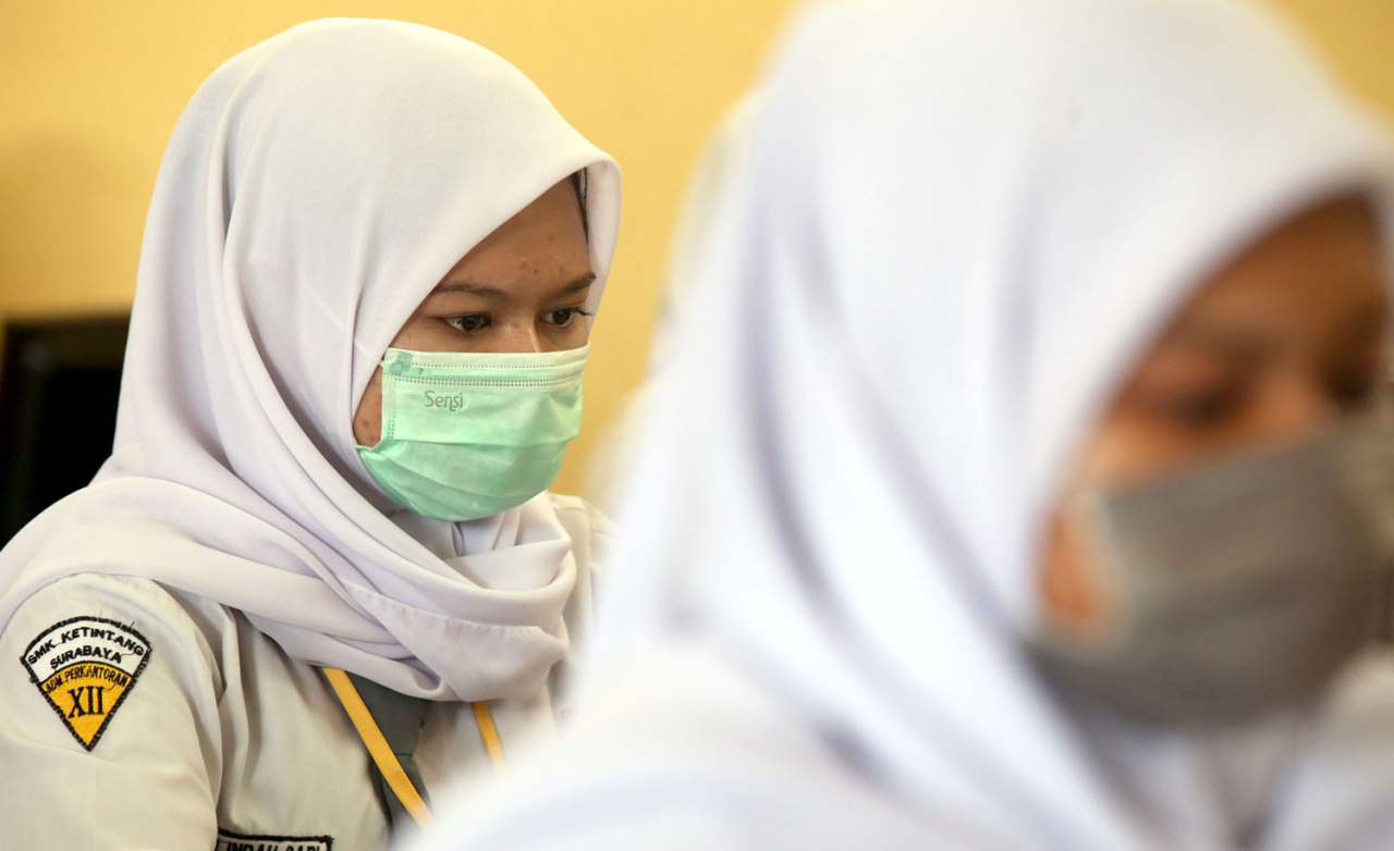 Pelajar mengkuti ujian nasional beberapa waktu lalu di Surabaya. Foto/Alim Perdana