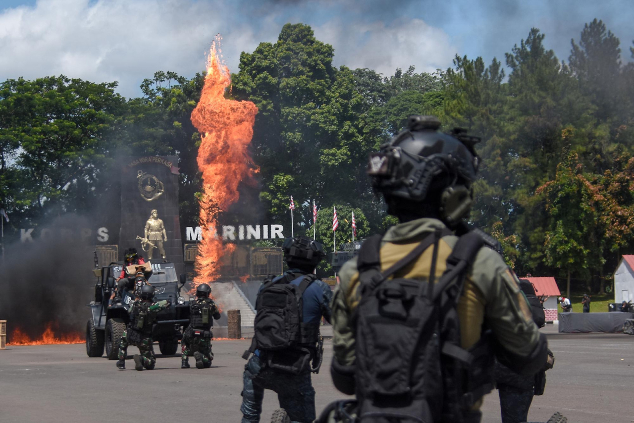 Aksi Heroik Para Ksatria Baret Ungu, pada saat Upacara Peringatan Hari Ulang Tahun (HUT) ke-80 Korps Marinir tahun 2025, Senin (17/11/2025). Foto: Dok-TNI AL/ Dispen Komar